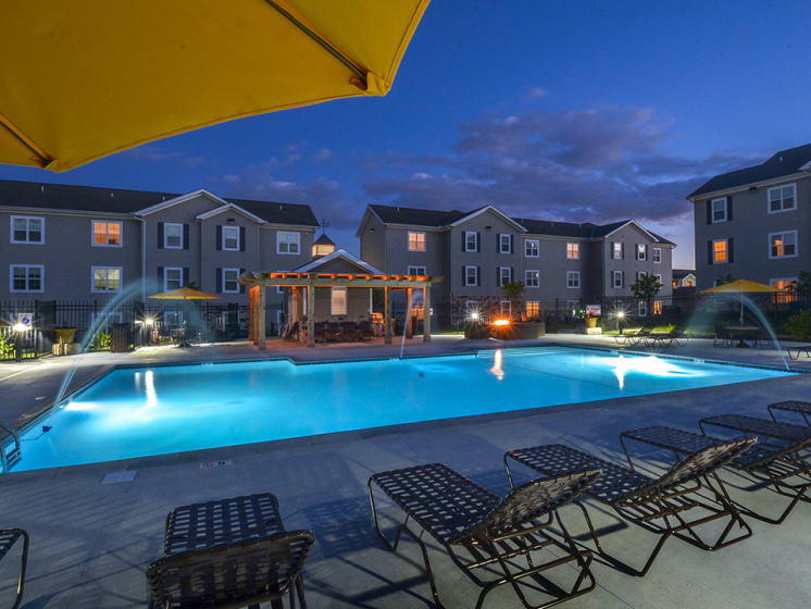 Outdoor Pool and Sundeck at Night